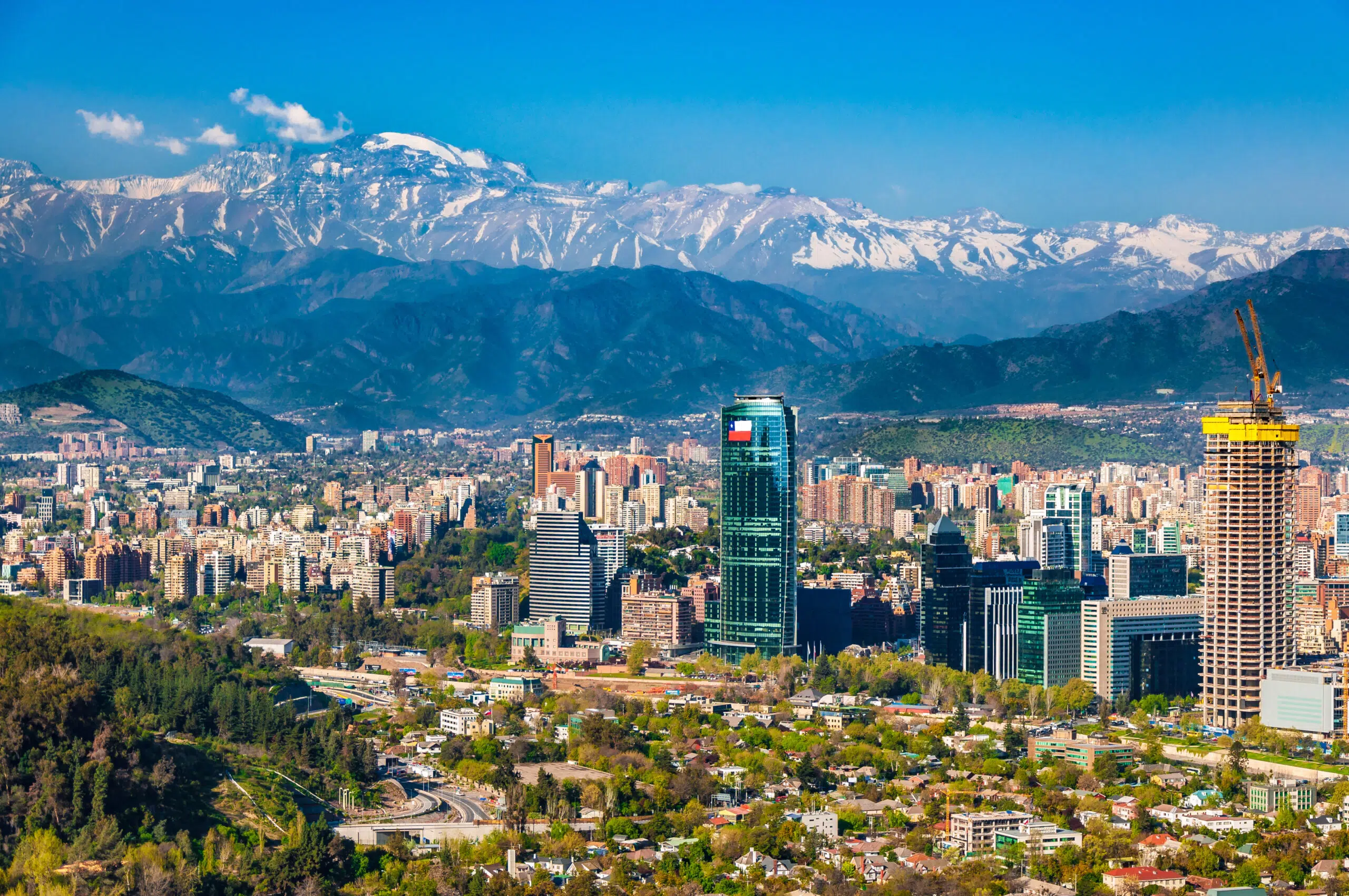 Aerial view of chile's capital with Manquehue in the background on a clear day in Santiago of Chile